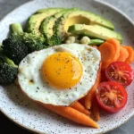 Sunny-Side Egg with Avocado, Tomatoes & Steamed Veggies