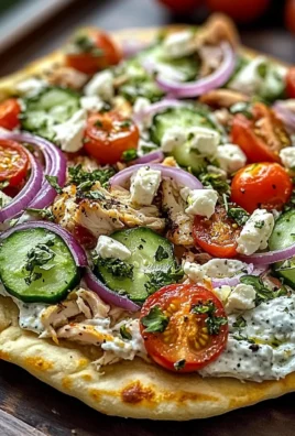 pizza topped with tzatziki sauce
